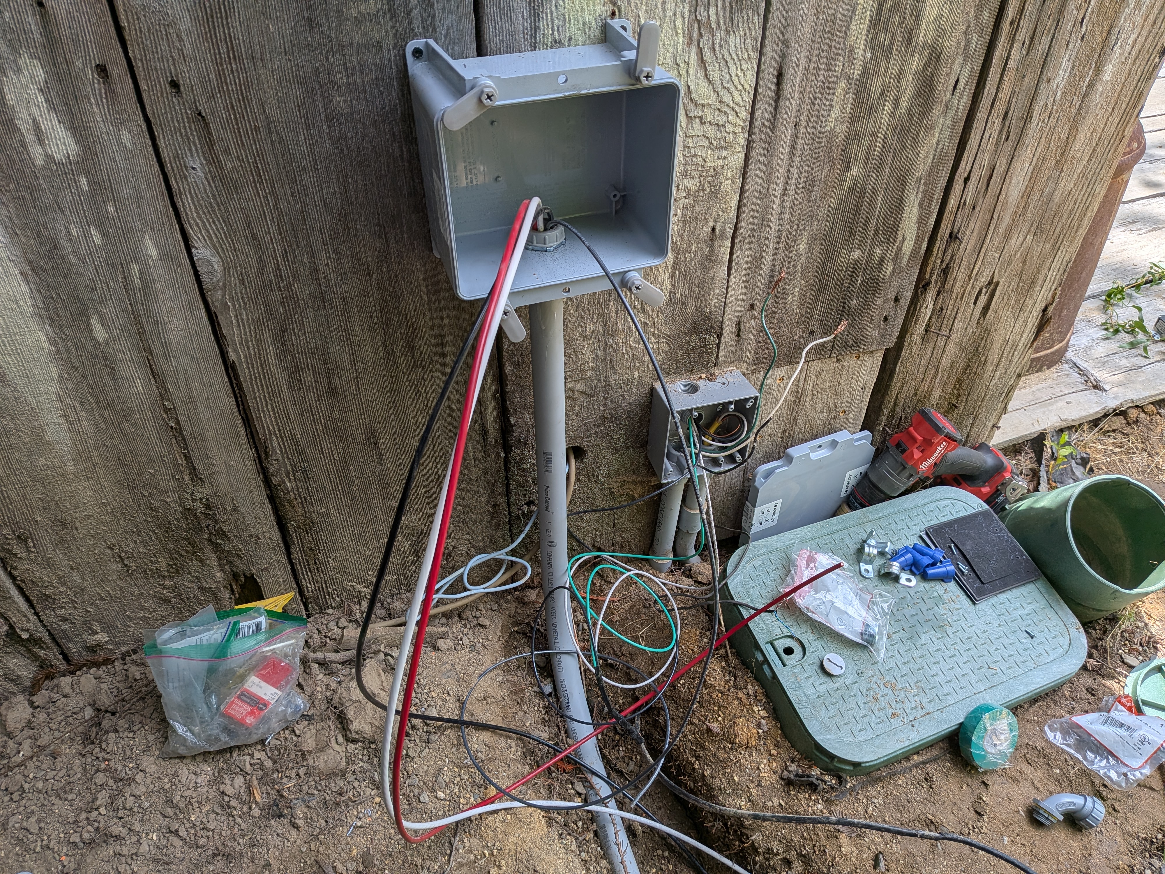 Photo of new electrical box next to existing, before making up
