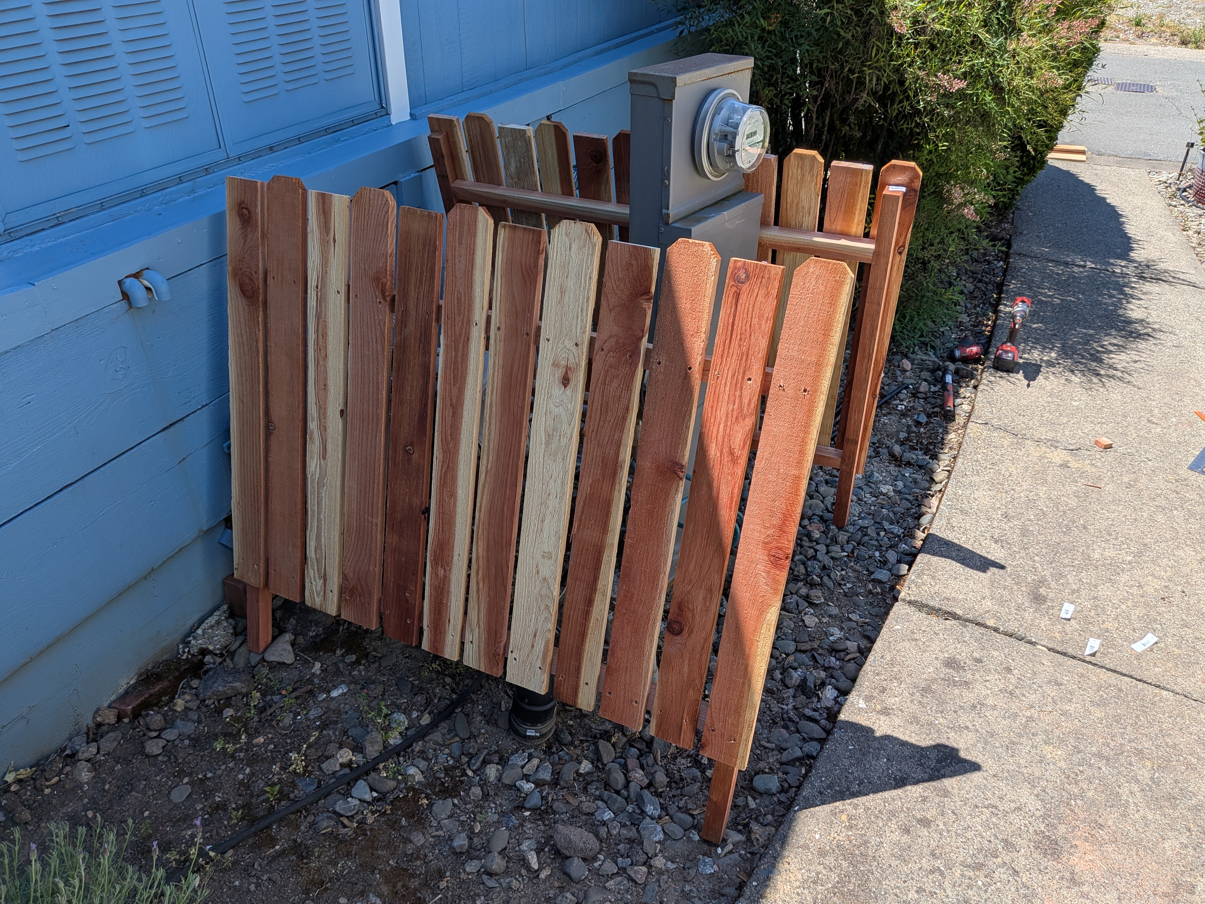 Privacy fencing around electrical panel and equipment - Progress image